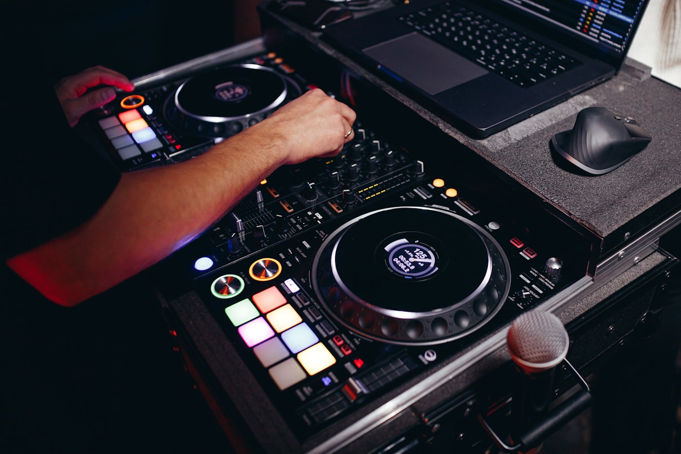 DJ controller and laptop used to save a SoundCloud mix or DJ set as MP3